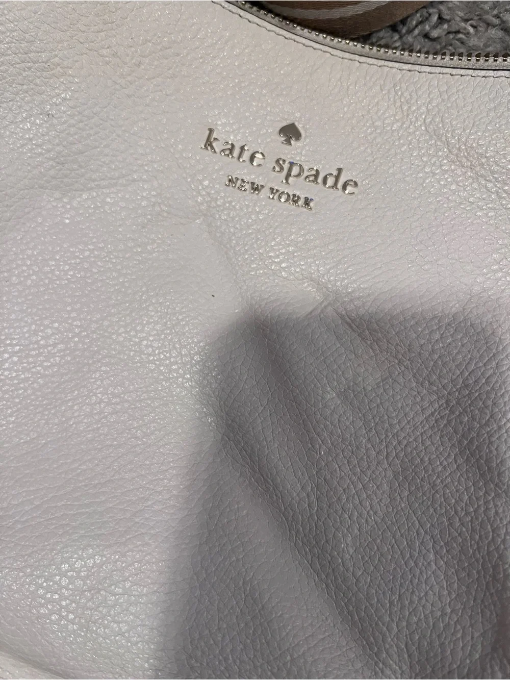 kate spade white pebbled leather crossbody with striped tan strap and coin pouch
